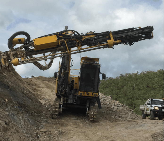 Beards Drilling technician using equipment for rock bolting services, demonstrating expertise in securing rockfall in various locations.